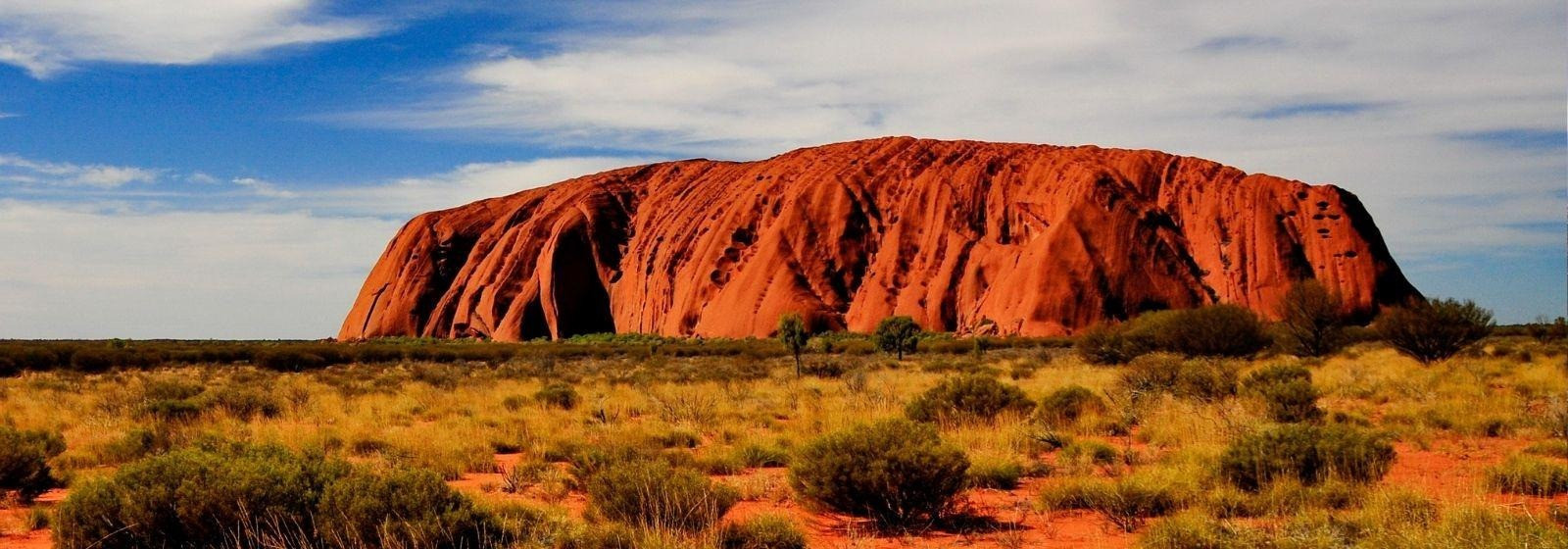 Uluru, also known as Ayers Rock, is the most famous place in Australia: an immense red monolith, alm