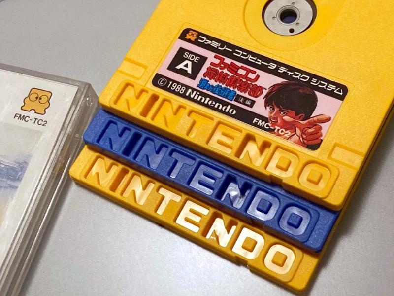 Some Famicom Disks. Note the indentations/molding of the ‘I’ and ‘N’ in Nintendo color/