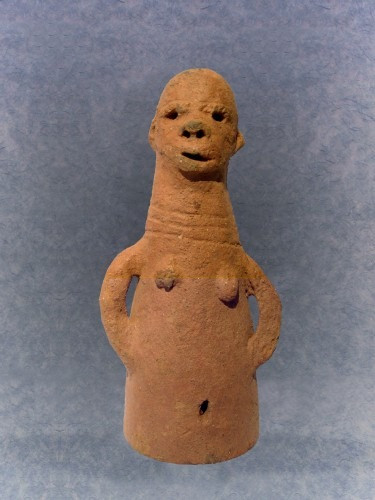 Lady with hands on waist - Sokoto. Another conical piece in our gallery, this female figure represen