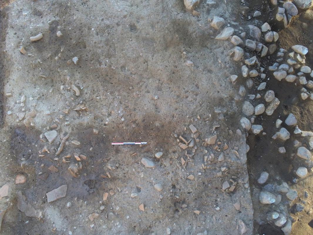 Ceramic fragments shattered and thrown back inside the building on the occupation floor.