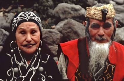 An Ainu couple: note the man's beard and the woman's tattooed lips.