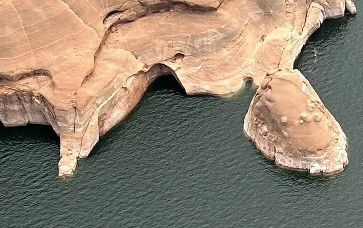 The center of this photo, taken on August 9, shows where the Double Arch formation used to be, befor