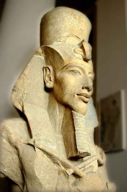 The alien and enigmatic face of Pharaoh Amenhotep IV-Akhenaten shows feminine features and superimpo