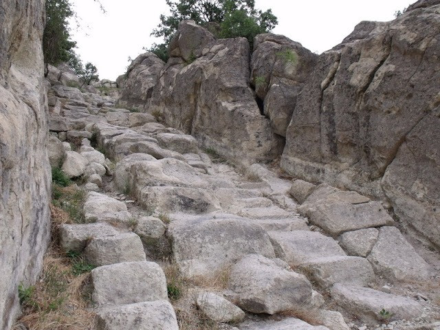 The rock-cut stairs leading up to Perperikon are much eroded and denote considerable antiquity. Note