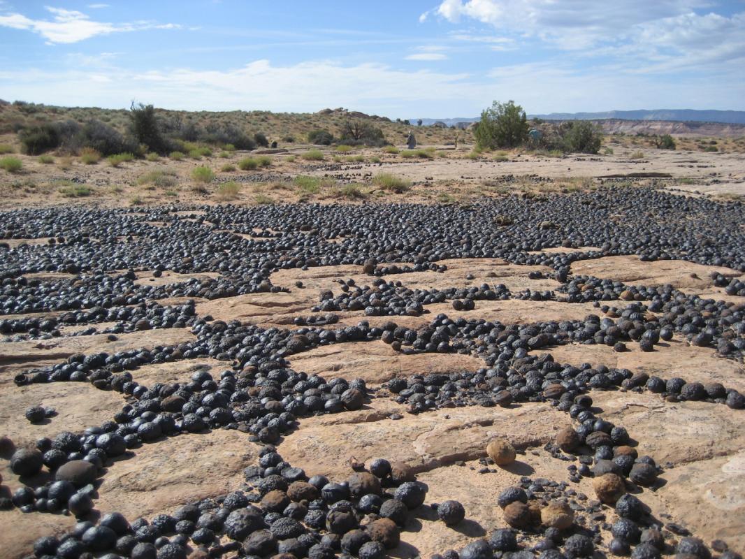 In Arizona and Utah, Moqui Marbles form real rivers , accumulating in cavities and cracks between th